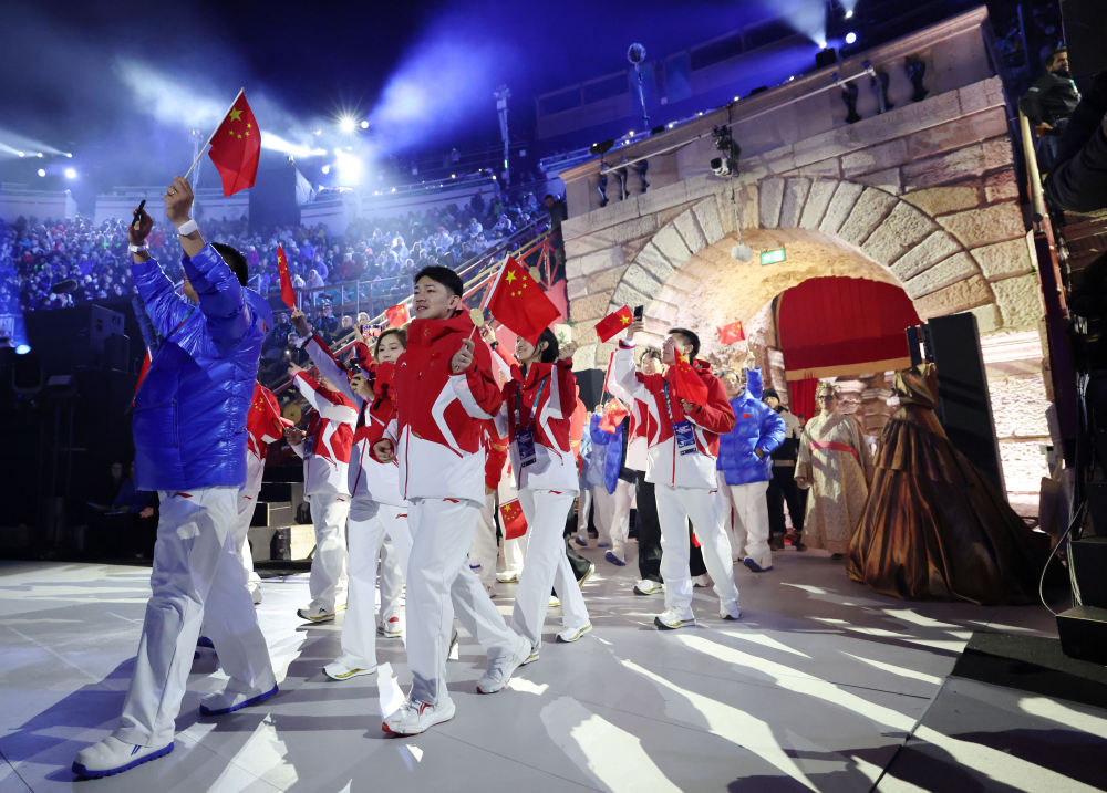 冬奥会 四十六载冰雪路 辉映绚丽中国红——写在米兰冬奥会中国健儿再创历史之际(图10)